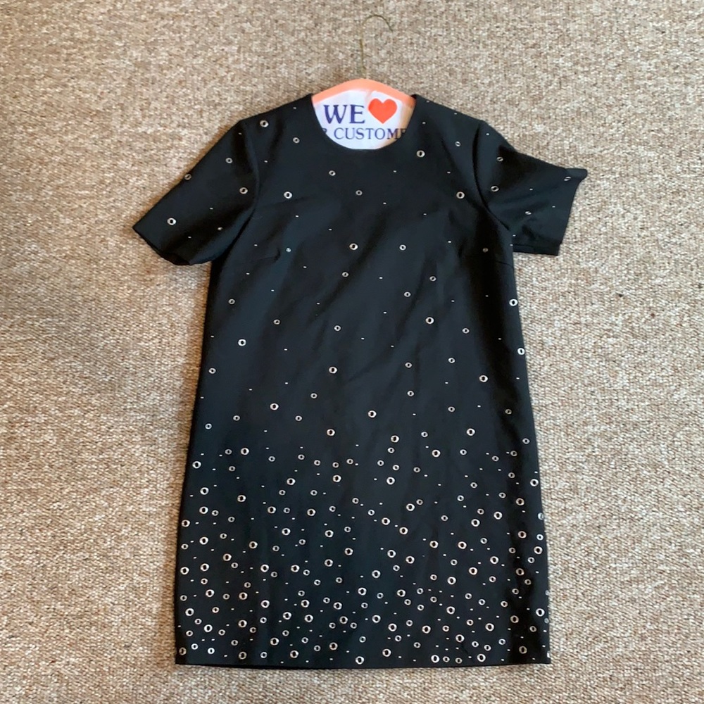 Black dress with metal circles